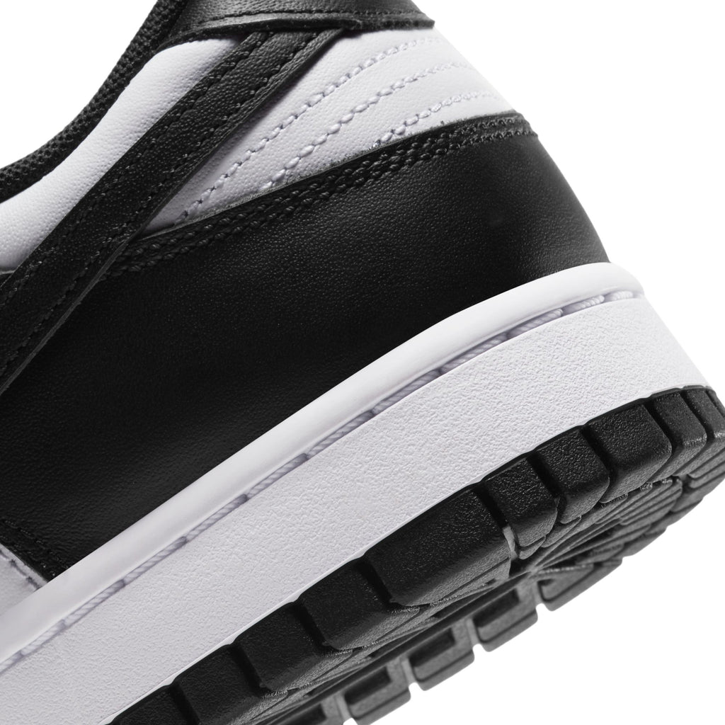 NIKE DUNK LOW RETRO -  WHITE/BLACK-WHITE