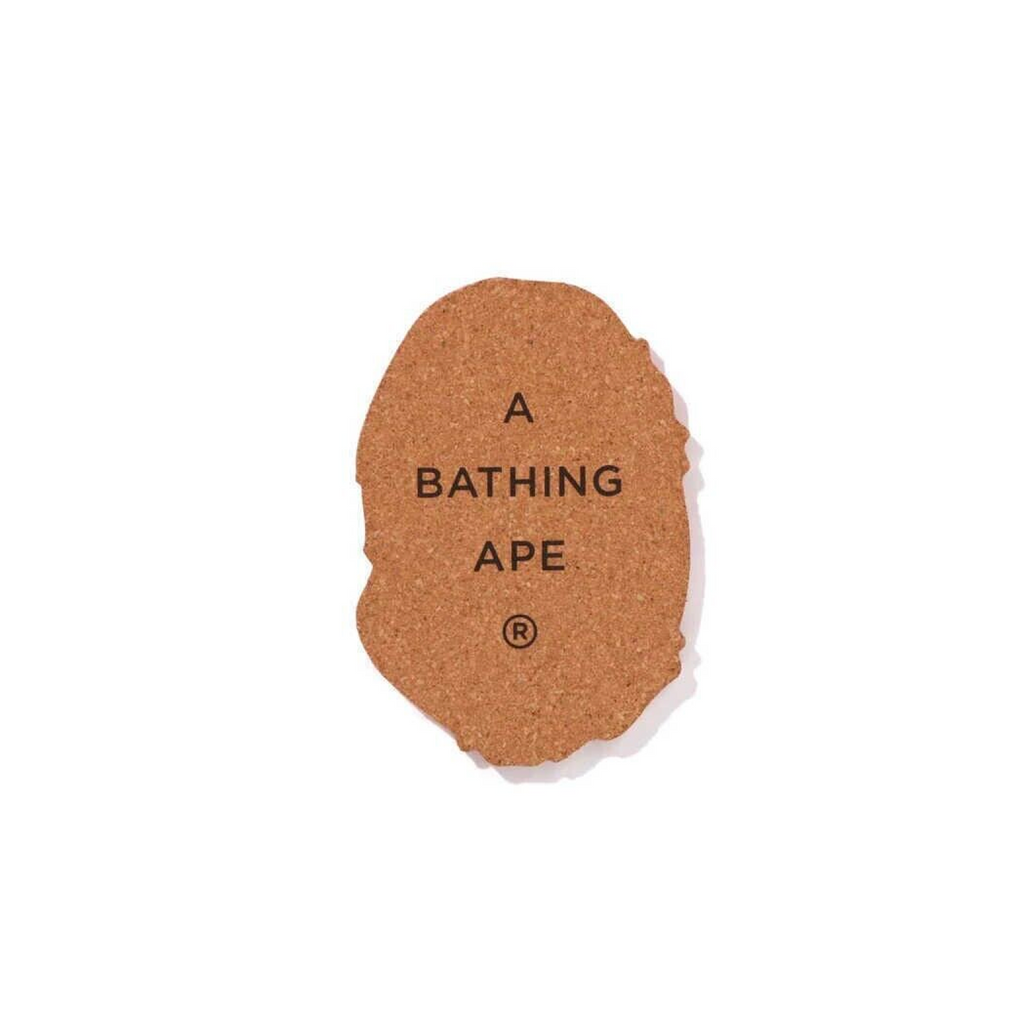 A BATHING APE APE HEAD CORK COASTER - BEIGE