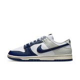 NIKE DUNK LOW RETRO -  WHITE/MIDNIGHT NAVY-PHOTON DUST
