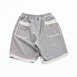 MASTERMIND WORLD CUT-OFF SWEAT SHORTS - GREY