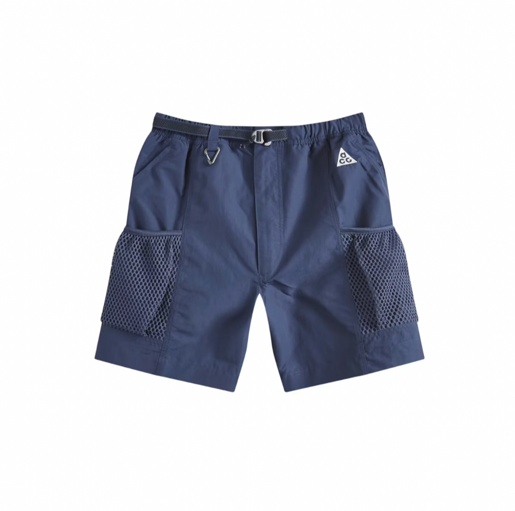 A pair of navy blue athletic shorts with a black elastic waistband, a black belt, and side mesh pockets, shown against a plain white background.