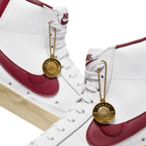 WOMEN'S NIKE BLAZER LOW '77 SE - WHITE/TEAM RED-MUSLIN-MTLC GOLD STAR